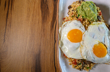 Fried Eggs on Quinoa with Guacamole