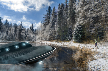 Person or child looking at UFO, broken space saucer lies in the water on the banks of a river or...