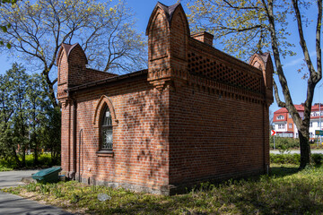 A gothic brick guardhouse (build XIX century) - obrazy, fototapety, plakaty