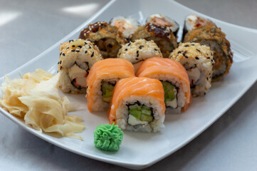 Sushi roll sushi with prawn, avocado, cream cheese, sesame. Sushi menu. Japanese food.