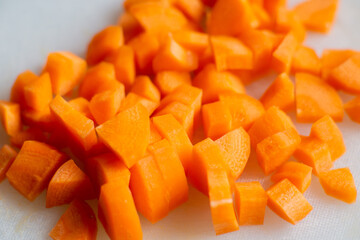 Diced carrots. Close-up. Food background. Vegetarianism, diet.