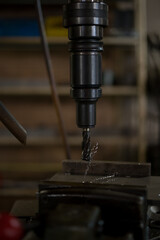 Thread cutting with a radial drilling machine