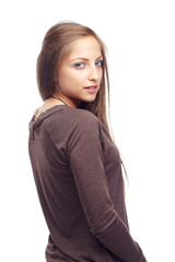 Fototapeta premium Youthful exuberance. Studio shot of a pretty young teen isolated on teen.