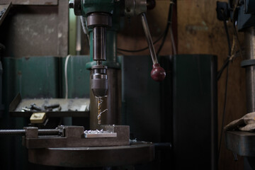 Part machining with drilling machine