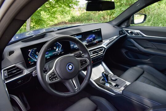 BMW i4 M50. Fully electric powerful and luxurious car. Cabin interior - dashboard. 06-10-2022, Prague, Czech Republic.