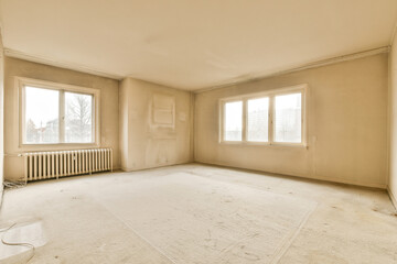 an empty living room with no one on the floor or furniture can be seen in this photo, as well