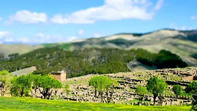 Panoramic view of the Roman ruins of the ancient city of  Cuicul-Djemila. UNESCO world heritage site. Miniature effect. Timelapse. Setif, Algeria
