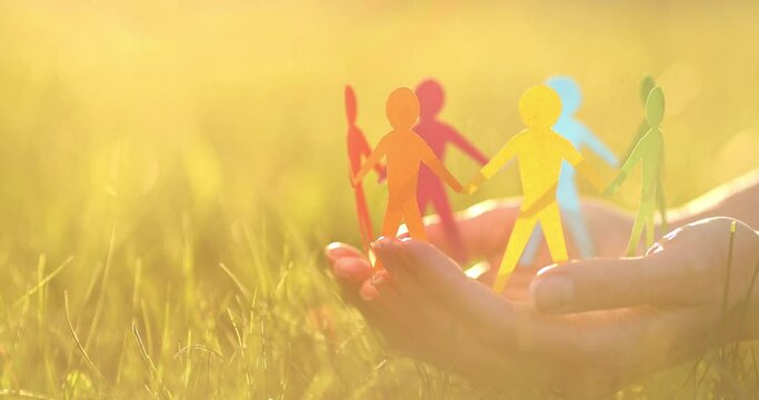 Silhouettes of people of different colors united. Help and protection concept