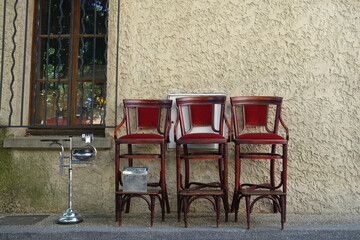 .shoe shine chairs outside an antique shop in France..