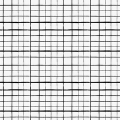 Seamless pattern of hand drawn inky checks in black and white. A modern design suitable for fashion, home decor, children's clothing, stationery, backgrounds and more.