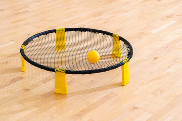 Spike ball game with yellow ball. Horizontal sport theme poster, greeting cards, headers, website...