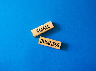 Small business symbol. Concept words Small business on wooden blocks. Beautiful blue background. Business and Small business concept. Copy space.