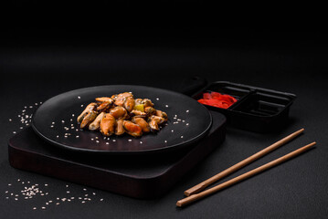 Delicious marinated mussels with spices and herbs on a ceramic plate