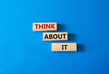Think about it symbol. Wooden blocks with words Think about it. Beautiful blue background. Business and Think about it concept. Copy space.