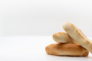 stack of breads isolated on white background, selective focus, seen from the front