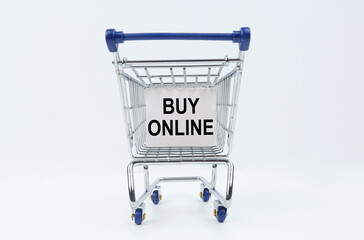 On a white background is a shopping cart with a sign that says - Buy online