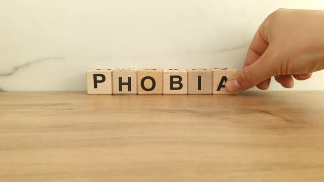 Phobia word from wooden blocks. The concept of anxiety disorders and mental health issues