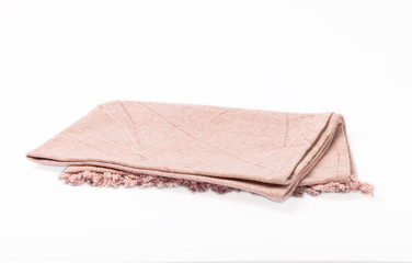 Kitchen towel .Pink napkin isolated on white background. Picnic towel. Home textiles. Folded cloth.Food serving design element. Square napkin.