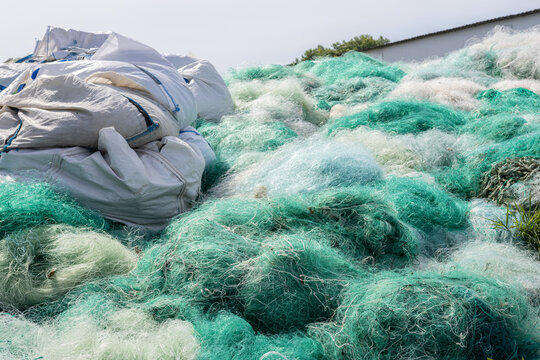 Used fishing net waiting to be recycled. Fishing industry waste