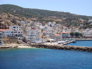 Fototapeta premium Karpathos, Greece, Monday 2 July 2019 Exploring amazing Greek island summer holidays trip background wallpaper fine prints products