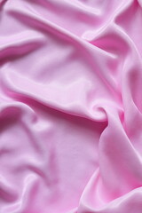 Pink shiny silk background, blank backdrop