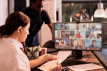 Remote team discussing company strategy on online meeting, employee chatting on teleconference. Office worker briefing, business report discussion on videoconference, collaboration