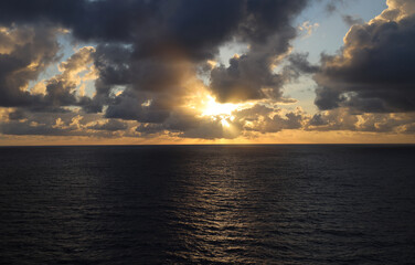 Naklejka na ściany i meble Cloudy sunrise on Southern Caribbean Sea