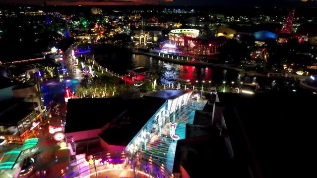 Downtown City At Orlando Florida United States. Amusement Park Downtown. Night Building Downtown Cityscape. Night Outdoor Downtown District Panning Wide. Night Cityscape Building Architecture.