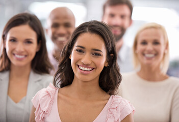 We do business with a smile. a group of smiling businesspeople.