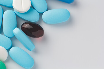various pills on a light background, vitamins and medicine