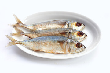 Salted fish on white background.
