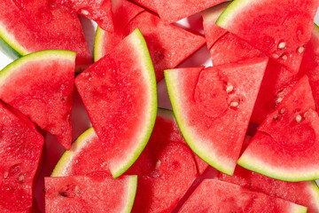 Background from slices of red ripe watermelon, summer concept