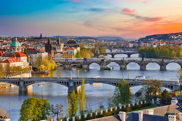 Fototapeta na wymiar View on Vltava river and Prague at sunset