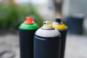 Close up of spray cans for drawing graffiti 