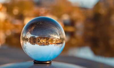 Crystal ball landscape shot with reflections on a car roof at Wiesenfelden, Bavarian forest, Straubing-Bogen, Bavaria, Germany