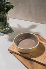 Empty bowl over wood boards