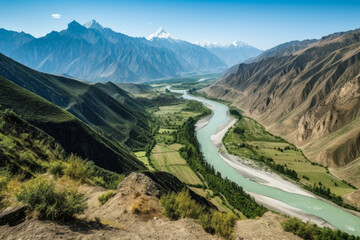 Fototapeta premium Breathtaking View stunning view of a mountain range from a high altitude with a bird's eye view of a meandering river and dense forests, generative ai