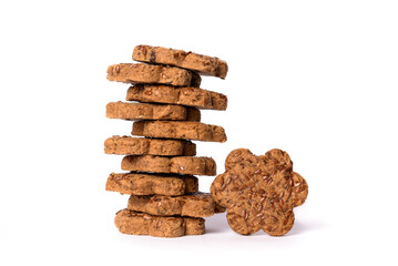 Bunch of fresh cookies with dried plums and caraway seeds on the white background