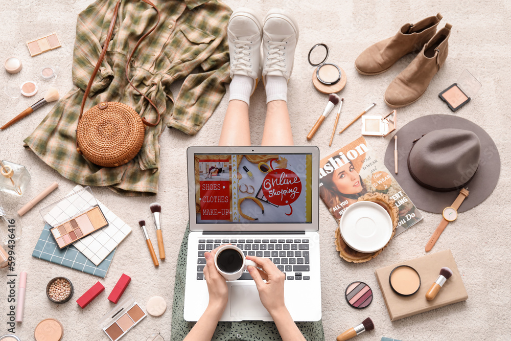 Sticker woman with cup of coffee, laptop, makeup products and accessories shopping online on beige carpet