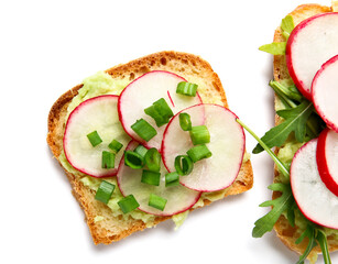 Delicious bruschettas with radish, green onion and arugula isolated on white background