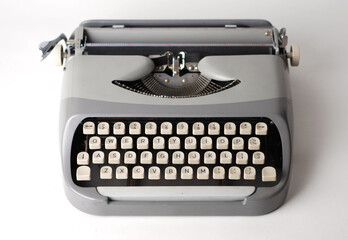 Vintage typewriter isolated on white background