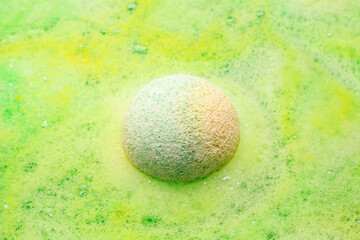 Bath bomb dissolving in water
