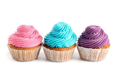 Tasty colorful cupcakes on white background