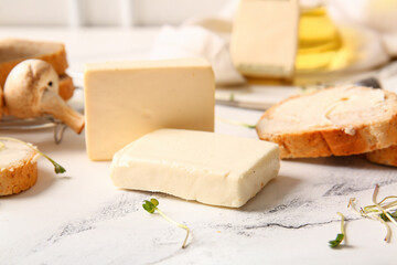 Sandwiches with processed cheese and mushrooms on grunge background