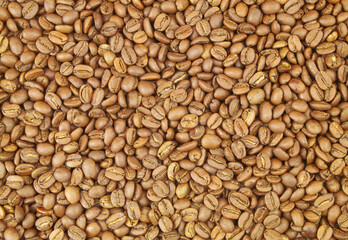 Roasted arabica coffee beans background as pattern