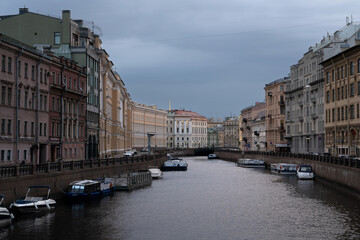 Moika River embankment and Singing Bridge on a cloudy spring morning, Saint Petersburg, Russia