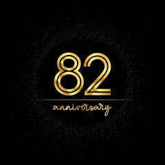 82 years golden number for anniversary with golden glitter and line on a black background