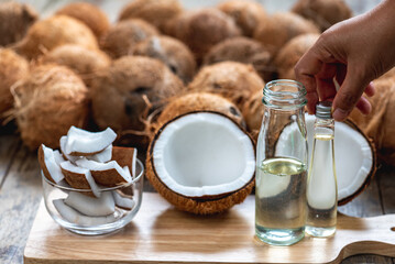Virgin coconut oil liquid by cold pressed with HDL by Raw coconut milk in glass bottle.
