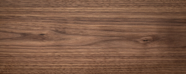 Naklejka premium Natural walnut grain with beautiful wood grain. Walnut long planks texture. Walnut wood texture background.