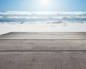 empty wooden table with blurred sea and beach with sky for us as display montage or show product.